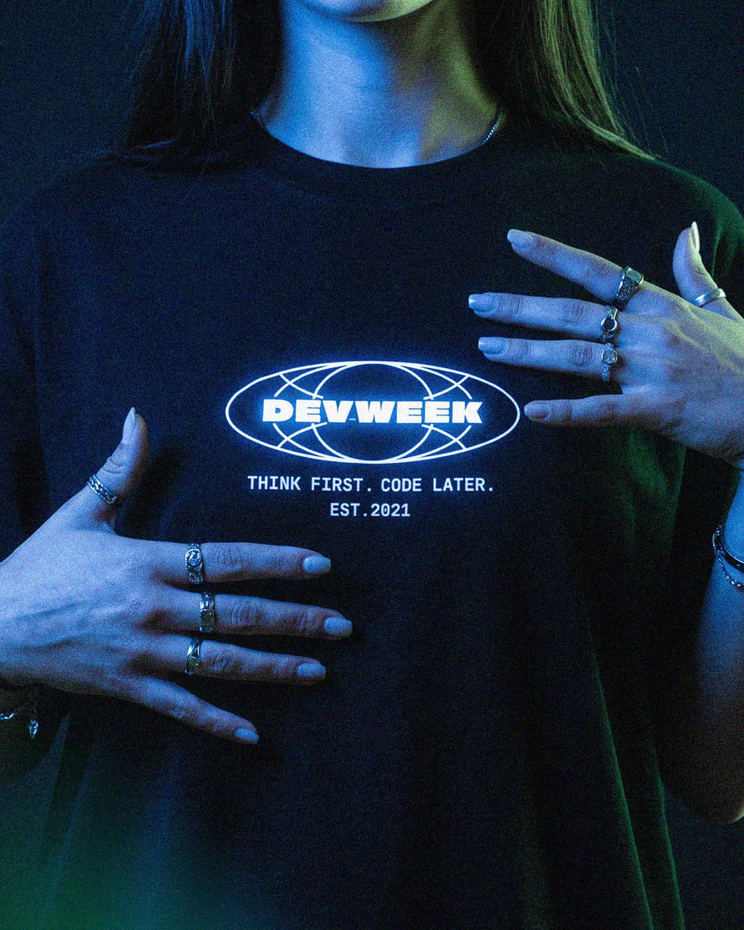 AI-generated DevWeek tee with a glowing globe print